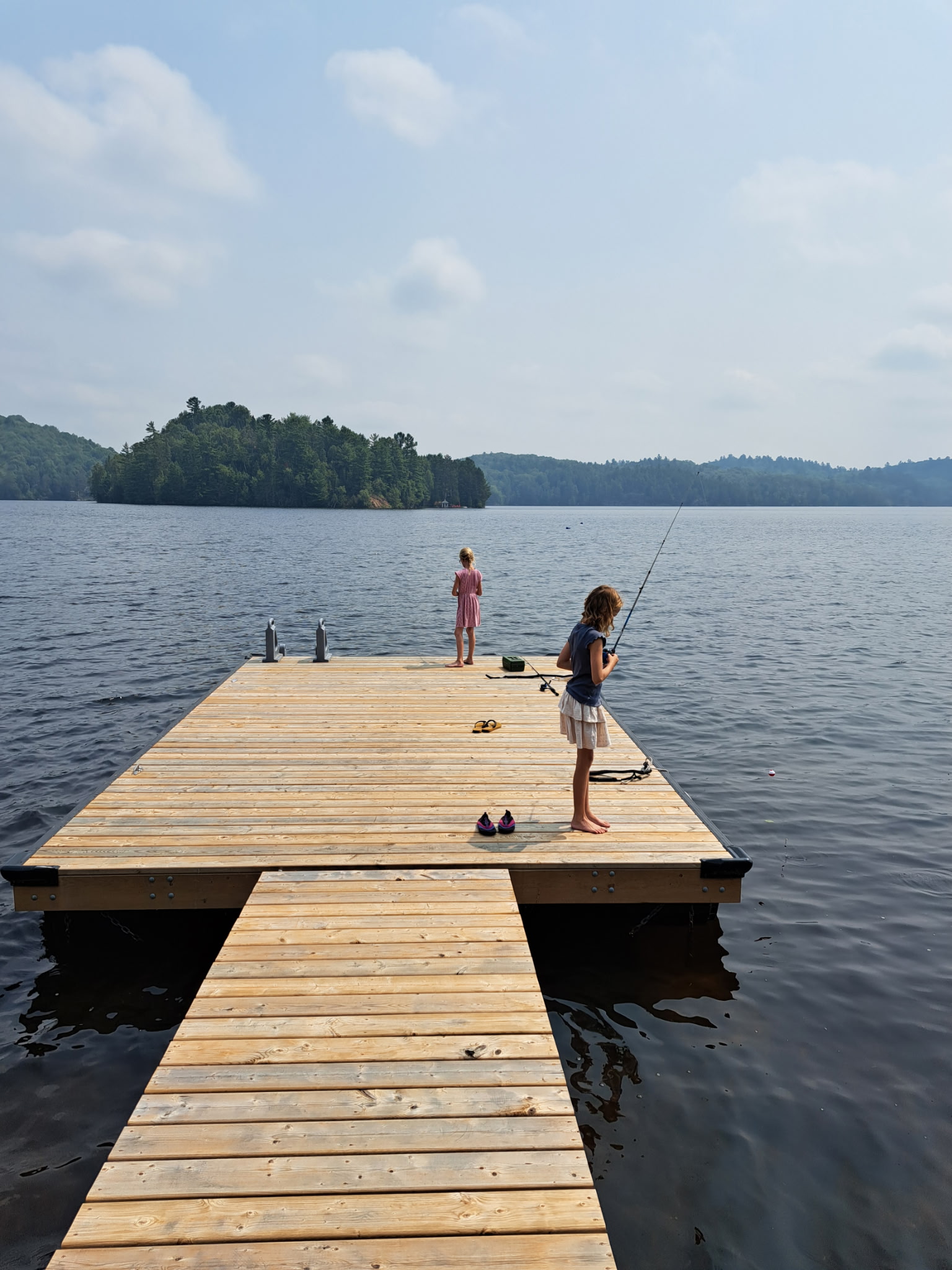 Deck with lake view and seating