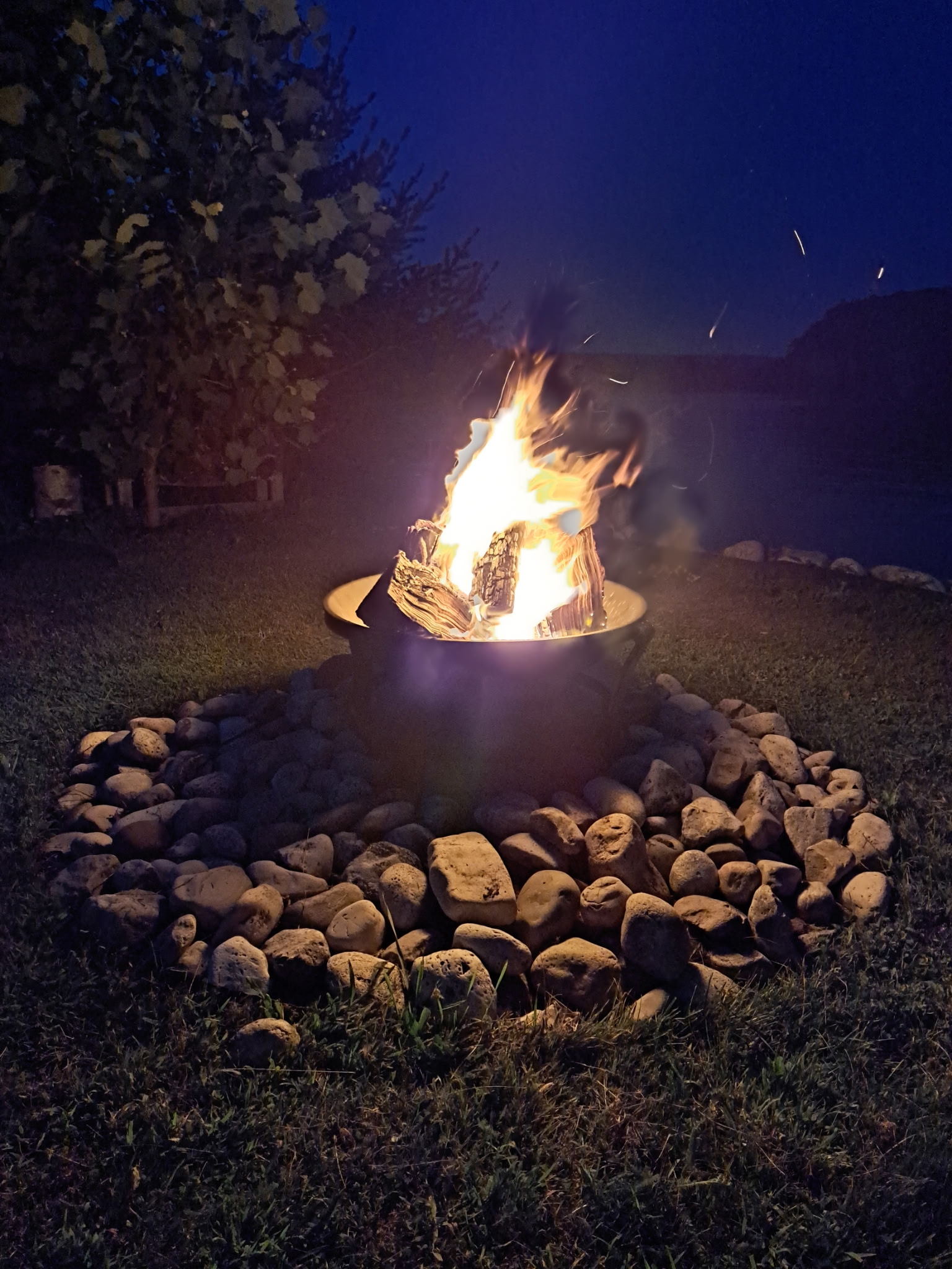 Back exterior of cottage with raised deck